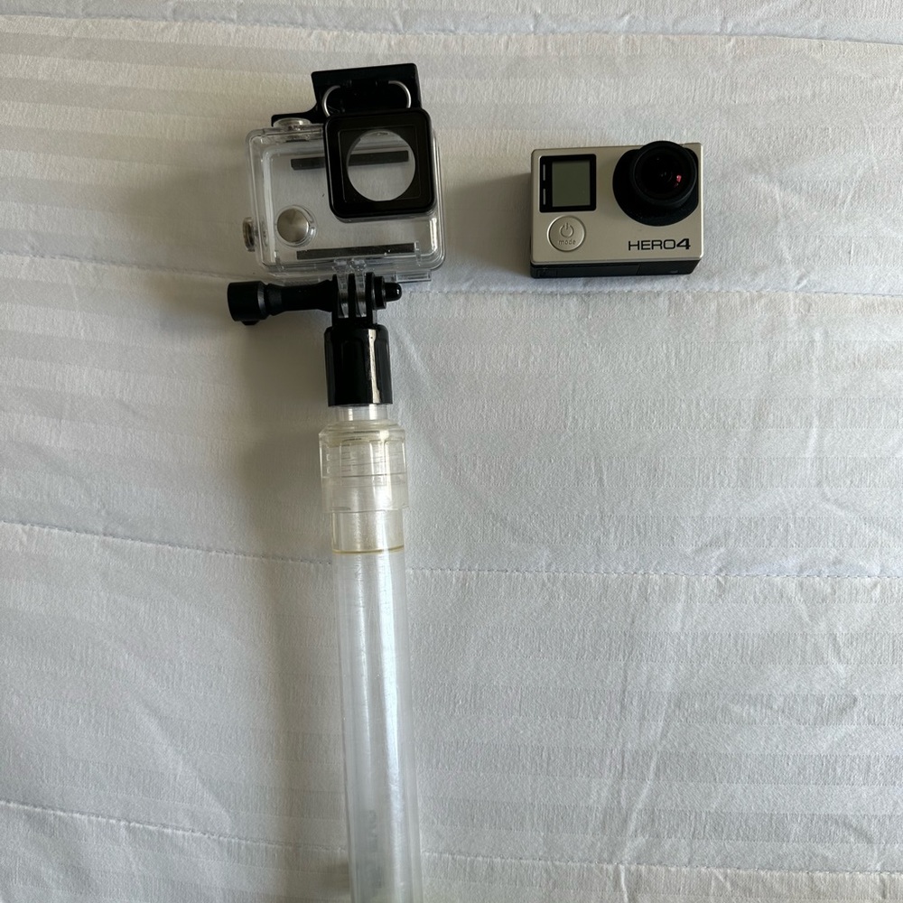 Go pro hero 4 - please note front has baby crack in plastic as pictured